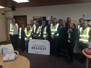 Royal British Legion Industries- a group picture of people in high viz vests